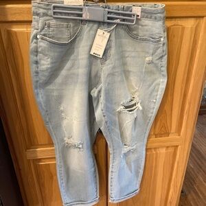 New tags size 18 W Judy blue jeans. They are a midrise boyfriend fit.